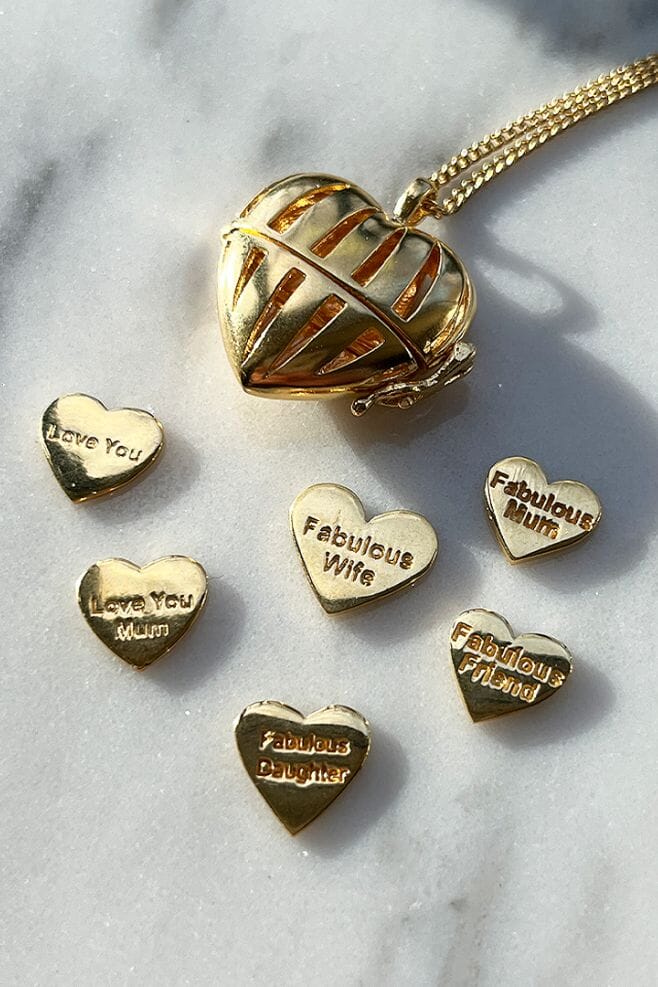 A Gold plated Silver keepsake Locket featuring a motto charm.