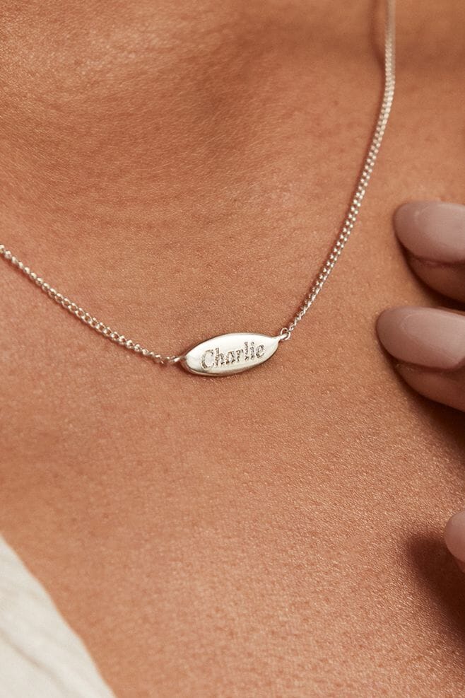 Handcrafted 925 Sterling Silver necklace, featuring an oval plaque charm - providing space for up to 8 characters.
