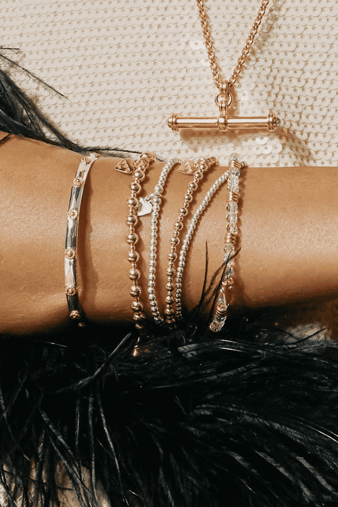 This stack mixes both gold and silver perfectly making it the standout stack of the season.