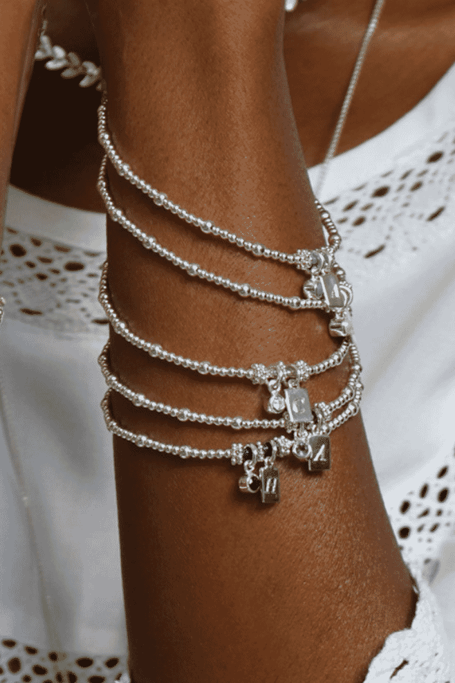 Personalised Zodiac Tag bracelet by Annie Haak. Handcrafted in 925 Sterling silver, it is inspired by Annie’s passion for astrology and healing.