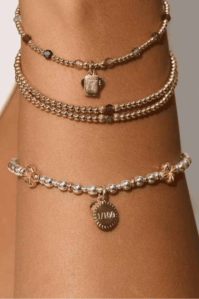 Annie Haak Limited Edition Festive Bracelet handcrafted in 925 sterling silver with gold-plated flower spacers and signature Dolly charm, individually numbered 1–100