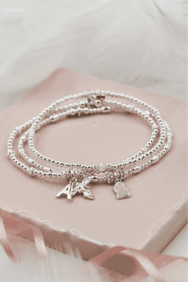 Handcrafted in 925 Sterling Silver, the classic Santeenie bracelet features a new Pink Ribbon charm filled with Italian Enamel that has been designed especially for this collection.