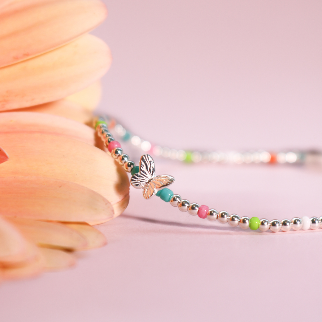 Annie Haak Designs Silver Stacking Bracelet with butterfly charm and colourful beads
