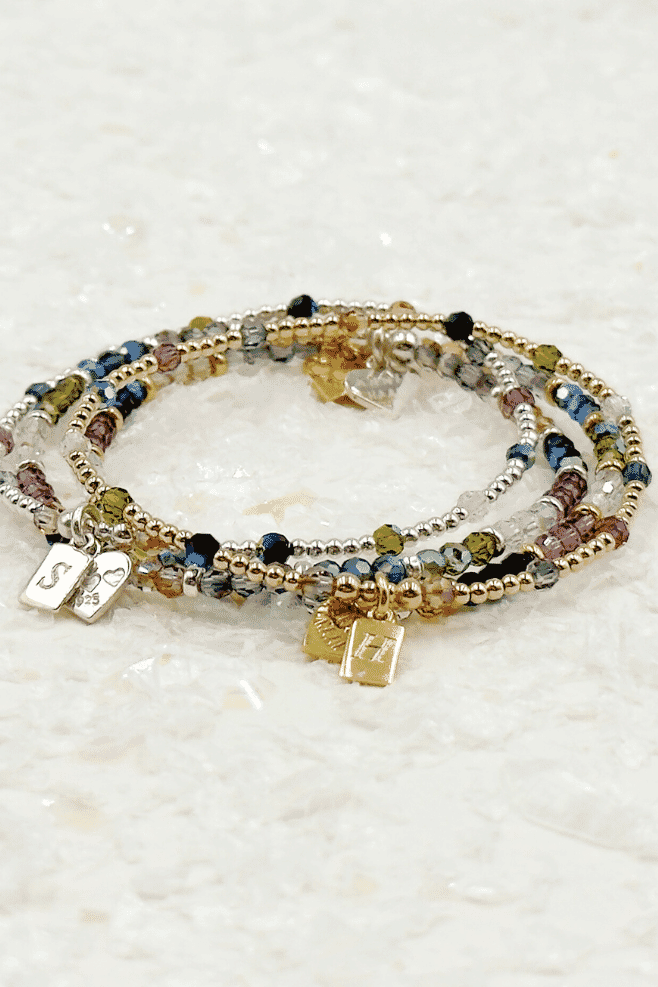 Sparkling jewellery collection featuring crystals, personalised engraving and initials.