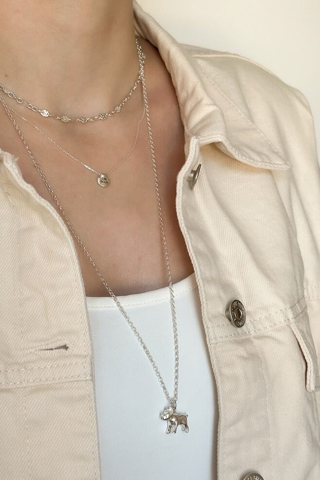 Hanging from a 925 Sterling Silver long chain, this solid pendant necklace makes the perfect gift for a French Bulldog (or any dog!) lover. Intricately detailed and handmade in Bali.