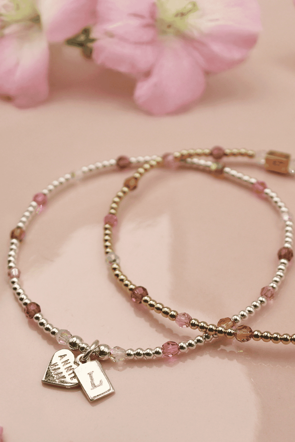 Add a touch of elegance to your outfit with our Personalised Mirage Bracelet. Made from 925 Sterling Silver and adorned with dazzling Preciosa crystals in cherry blossom hues.