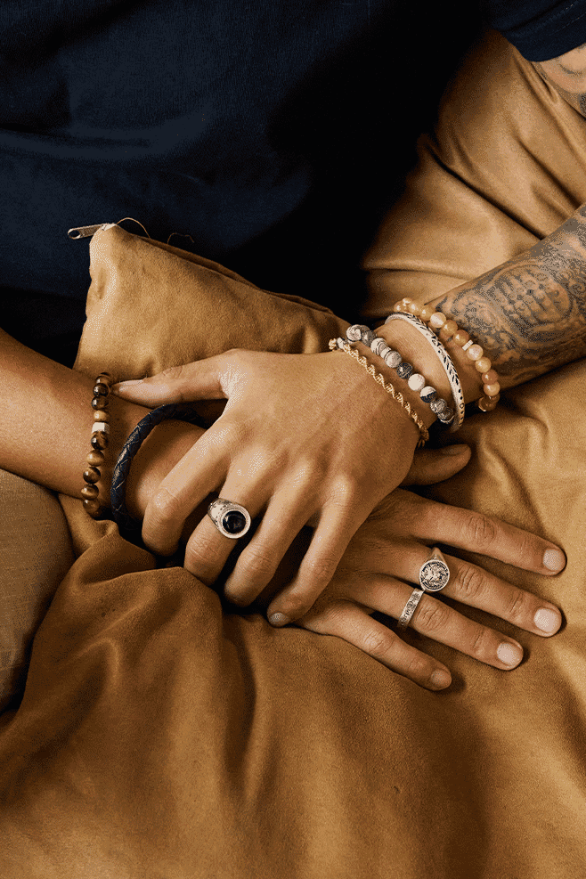 This handcrafted bangle is made from 925 Sterling Silver and features oxidised detailing.