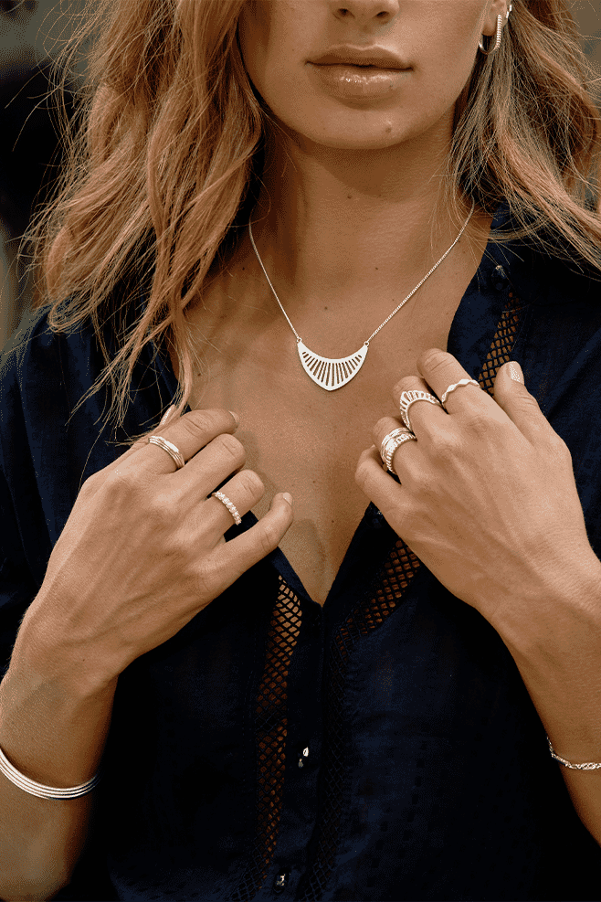 Ring featuring eight preciosa pearls that sit prettily on the classic 925 Sterling Silver band.