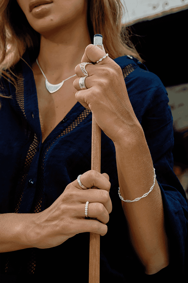 Ring featuring eight preciosa pearls that sit prettily on the classic 925 Sterling Silver band.
